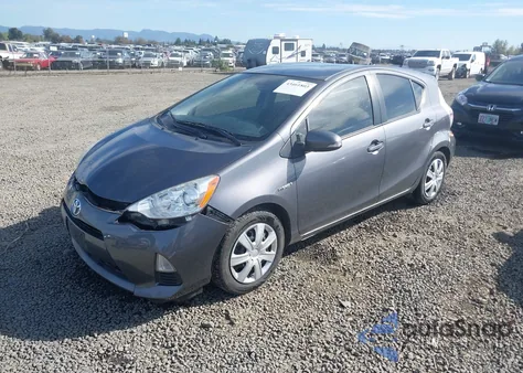 2014 Toyota Prius C Two z USA, uszkodzony, nr VIN JTDKDTB38E1571758